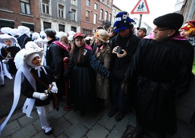 Paysans au carnaval de Binche.